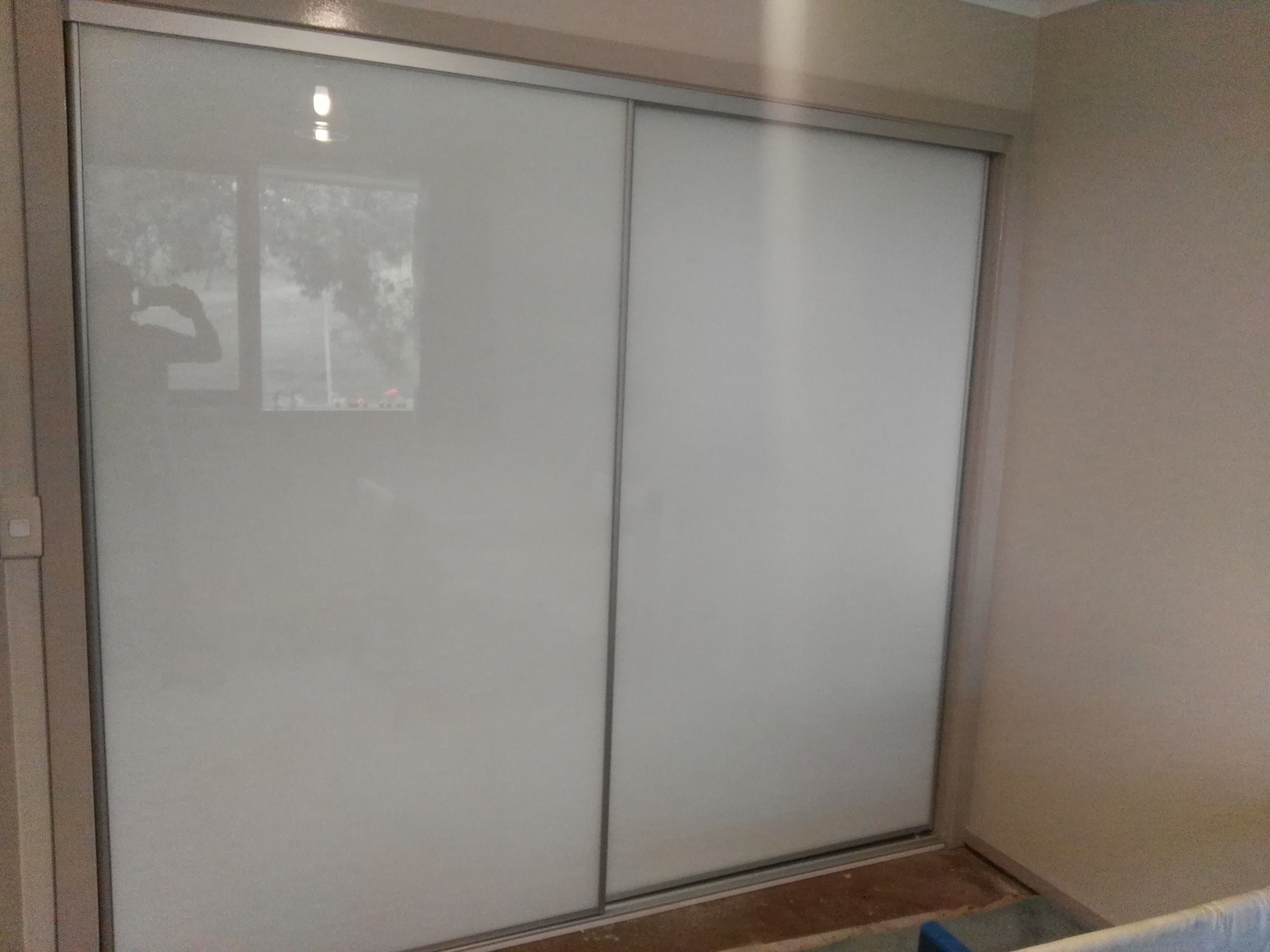 Sliding Wardrobe Doors with White DECORE Panels